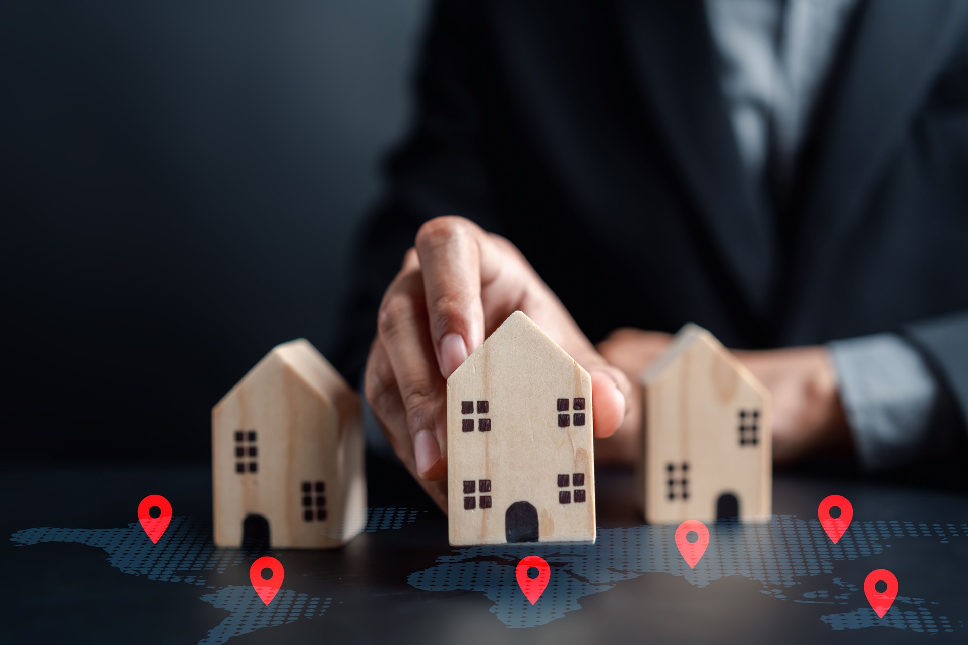 Increased value of real estate. Businessman building and find location, home investment planning real estate business income earning profit Investor thinking strategy.